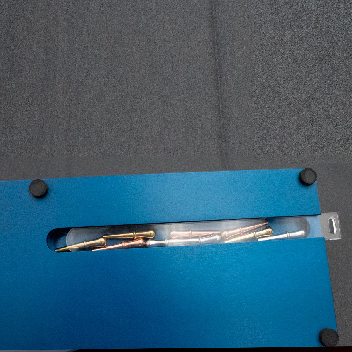Underside storage detail on a blue Kodiak cribbage board